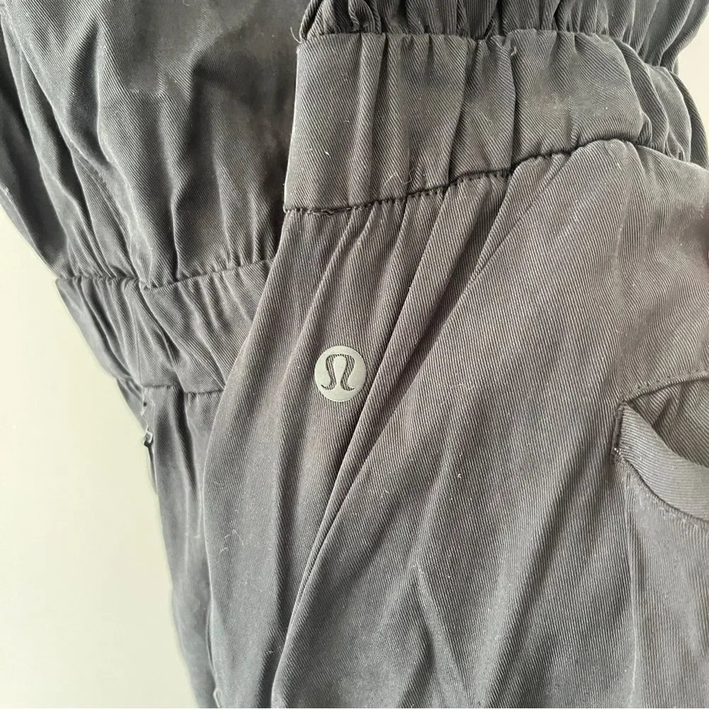 Lululemon Black Perfectly Poised Jumpsuit Short Sleeve Stretch Pockets Size 4